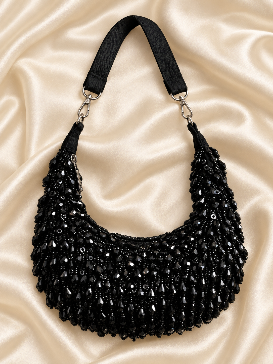 Aabha black pearl beaded crescent clutch flat lay