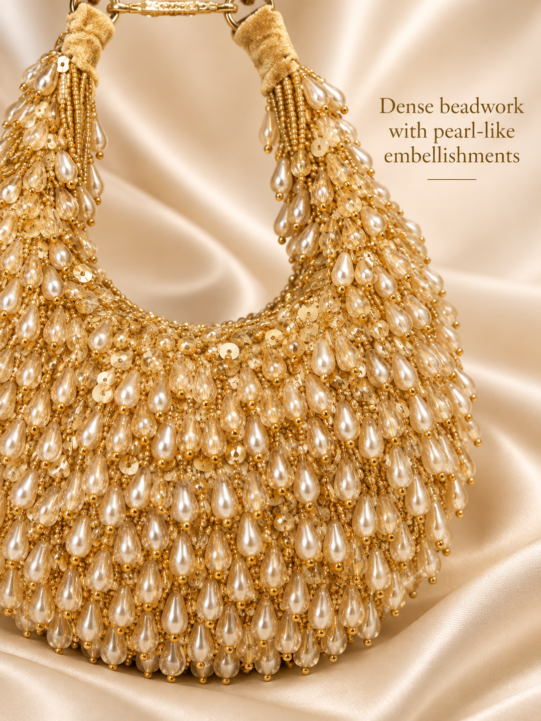 Gold dense beadwork with pearl-like embellishments close-up