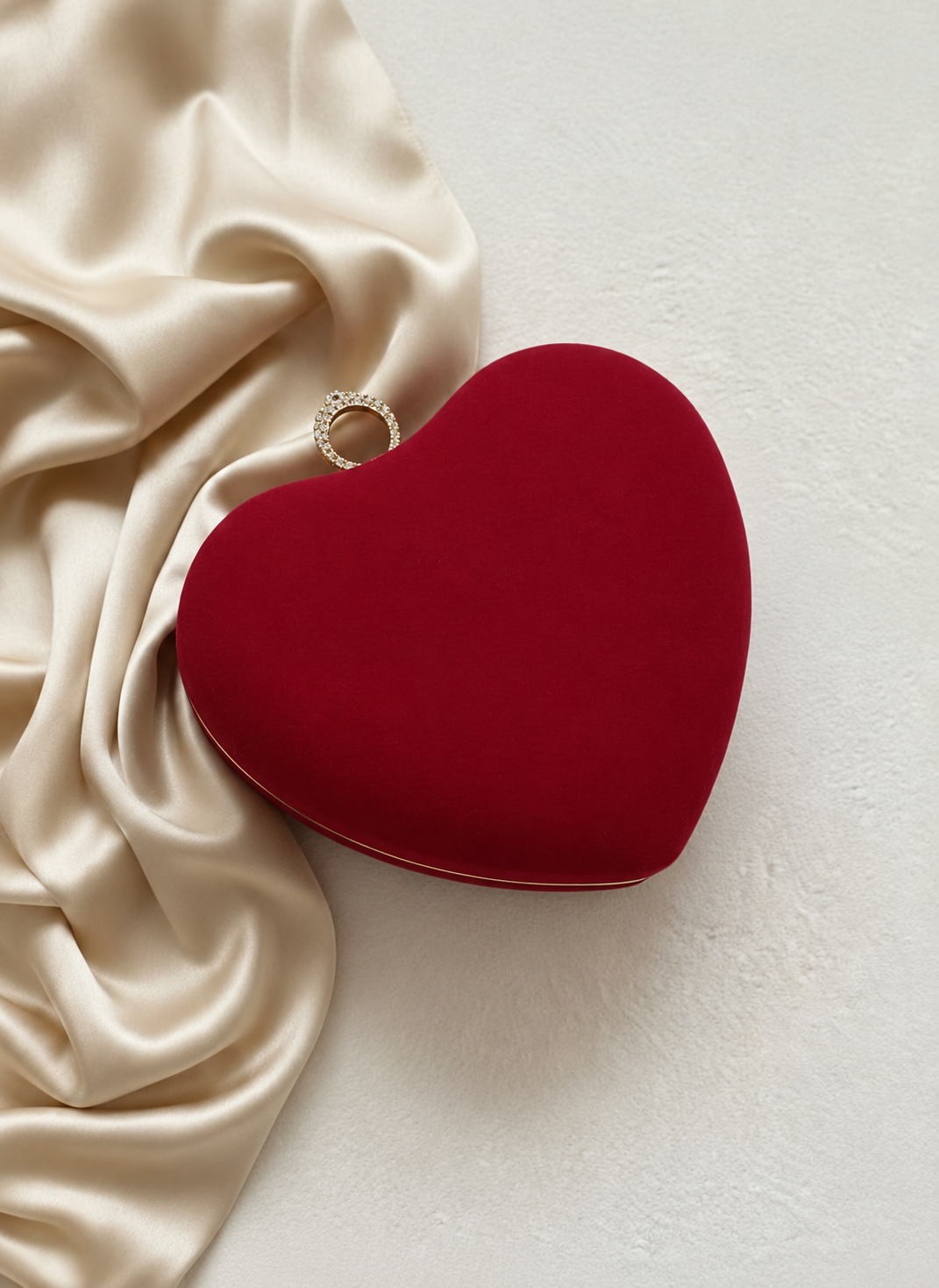 Red velvet heart-shaped clutch without name or initial