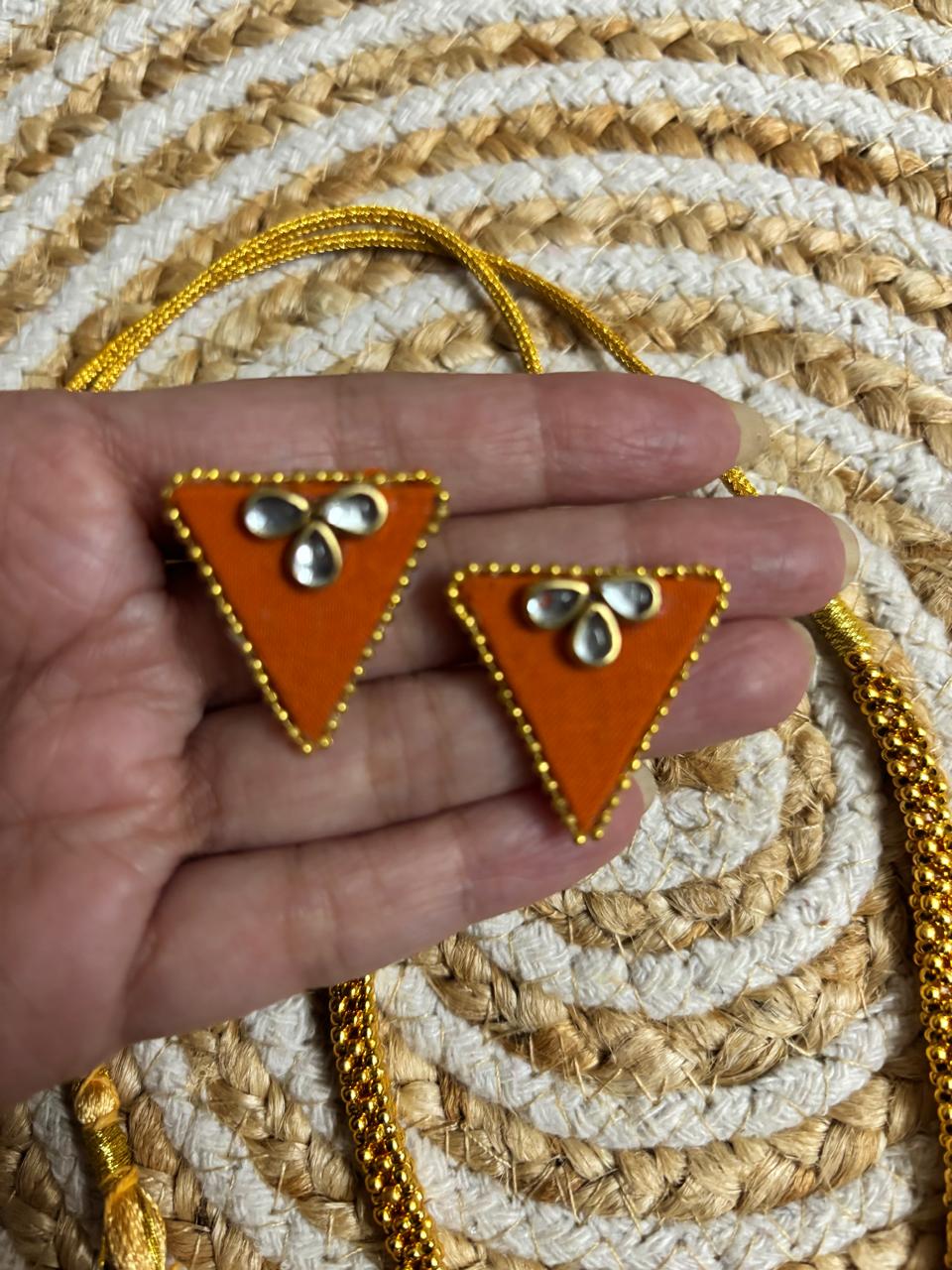 The Rust Edit coordinated triangular orange fabric earrings